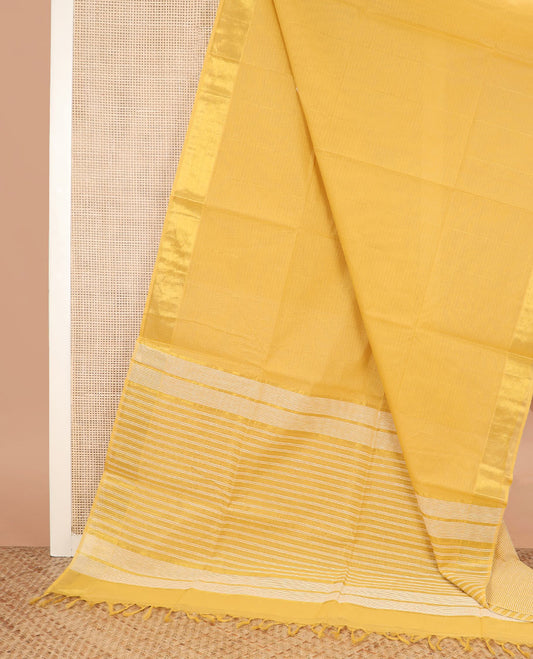 Yellow sparsely striped jute cotton saree, zari border, and striped pallu