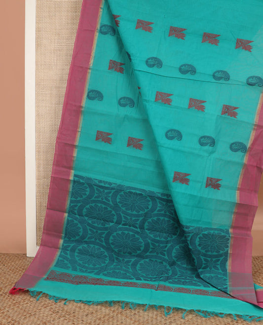 Blue buttas kanchi cotton saree, contrast border and circle motif pallu