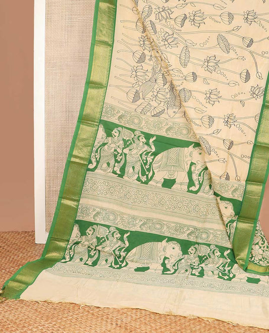 Light sandal lotus and fish motifs machine printed kalamkari cotton saree, contrast traditional zari border, and pallu of human and elephant motifs