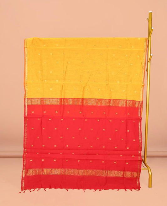 Yellow Maheshwari Cotton Saree, Sparsely Woven with Buttas All Over Its Body, Subtle Zari Piping Border, Complemented by a Contrast Pallu Steeped with Buttas, and Paired with a Contrast Blouse