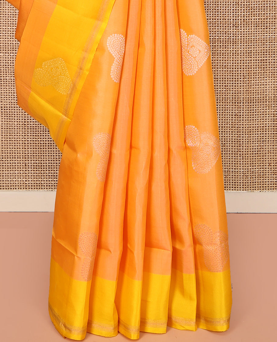 Orange Mayuri Lite Silk Mix Saree, Opulently Embellished with Buttas All Over Its Body, Complemented by a Contrast Zari Striped Border, Pallu of Spiral Designs, and Paired with a Contrast Blouse