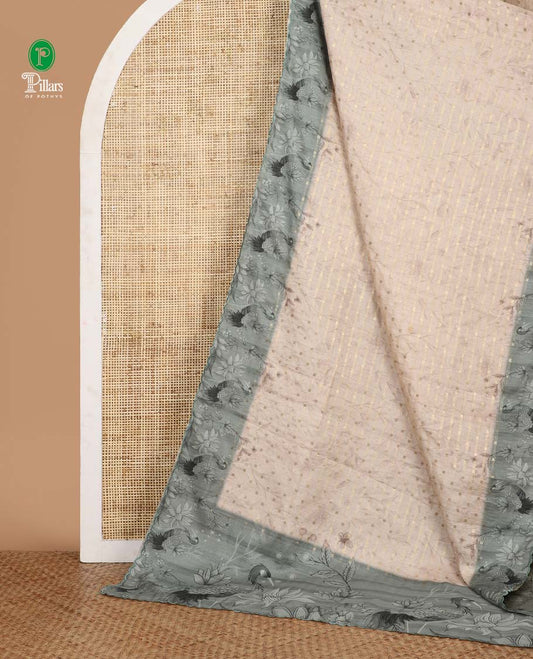Cream leaf vine digital printed and 1000 dobby-style buttas woven semi-tussar saree, contrast green scallop border & pallu of floral & bird motifs print