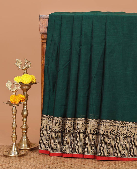 Bottle green plain masraise cotton saree, contrast border of elephant, peacock & geometric design & lining seer pallu