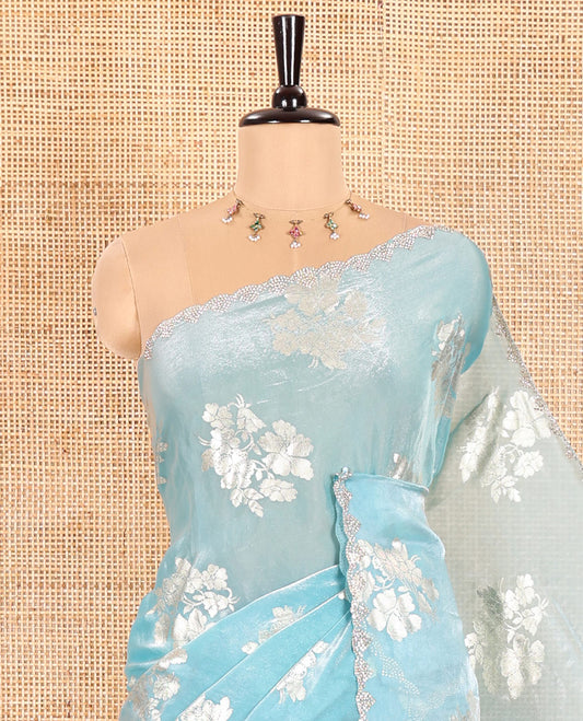 Blue Fendi Satin Saree Enlivened with Floral Motifs in Golden Foil Prints, Sparkling Scallop Swarovski Stone Work Border, Pallu of the Same Foil Prints, and Comes with a Matching Colored Stone Work Blouse