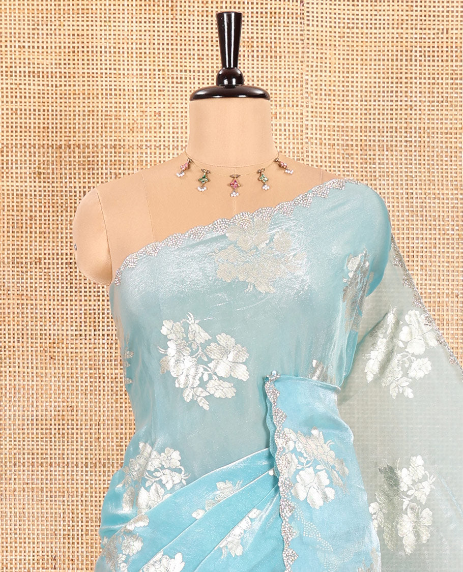 Blue Fendi Satin Saree Enlivened with Floral Motifs in Golden Foil Prints, Sparkling Scallop Swarovski Stone Work Border, Pallu of the Same Foil Prints, and Comes with a Matching Colored Stone Work Blouse