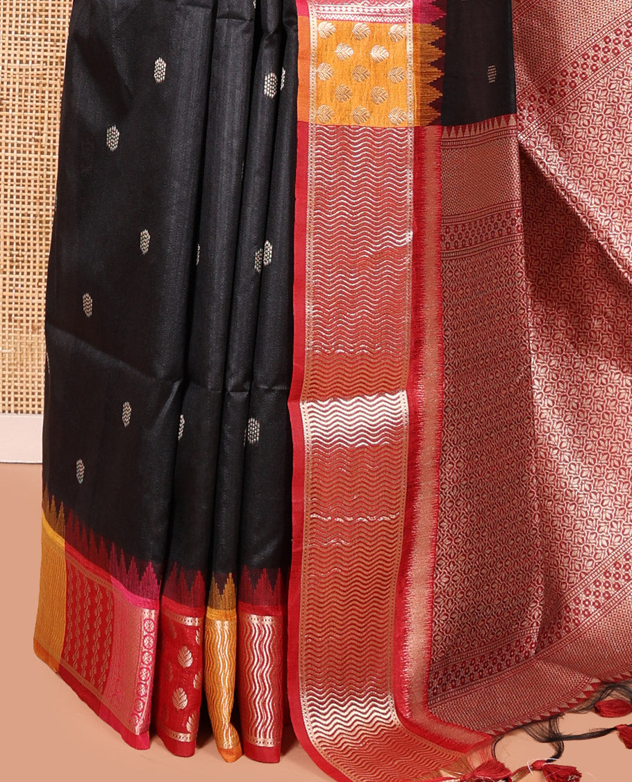 Black Semi-Raw Silk Saree, Elevated with Buttas All Over Its Body, Complemented by Contrast Meenakari-Style Woven Border of Geometric Zari Designs, Majestically Detailed Pallu, and Paired with a Contrast Blouse