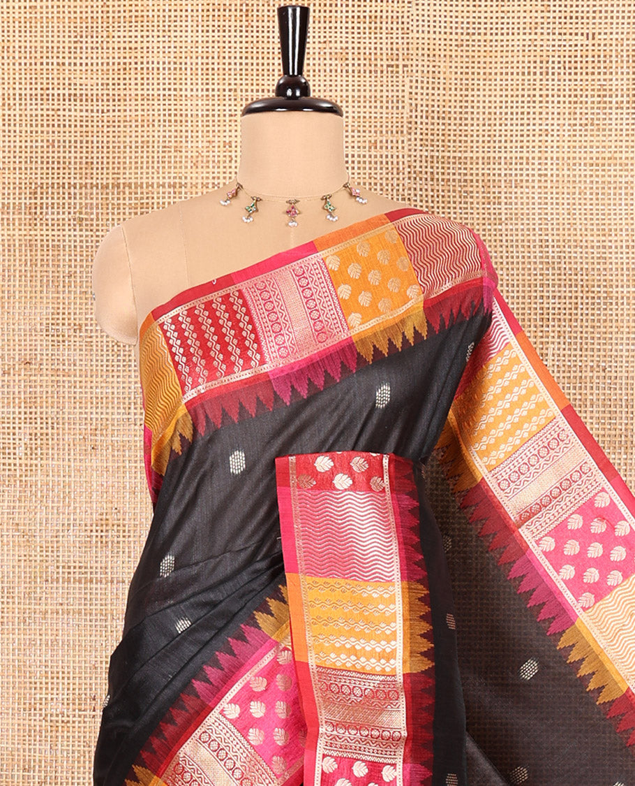 Black Semi-Raw Silk Saree, Elevated with Buttas All Over Its Body, Complemented by Contrast Meenakari-Style Woven Border of Geometric Zari Designs, Majestically Detailed Pallu, and Paired with a Contrast Blouse