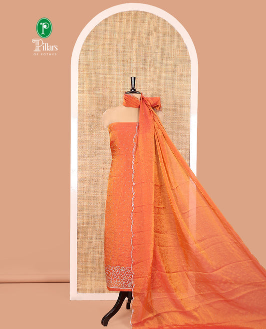 Orange Moss Organza Material Churidar Set, Gleamed Up with Swarovski Stone Work-Style Floral Top, Comes with a Plain Santoon Bottom, and Is Paired with Swarovski Stone Work Moss Organza Dupatta