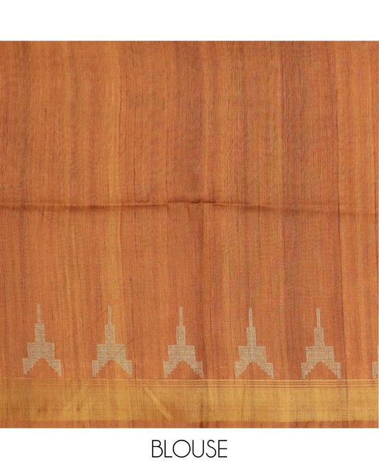 Orange plain design tussar silk saree, temple bavanji border, and figurines printed pallu