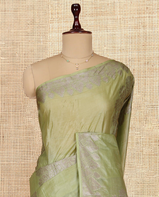 Green Tusser Silk Saree, Bedecked with Floral Design, a Zari Border, Floral Pallu, and a Matching Blouse