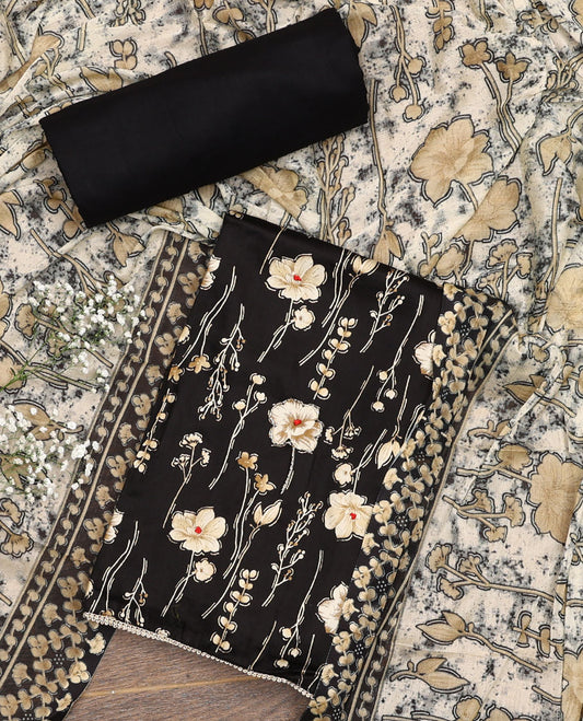 Black material chudidar set, floral motifs printed top, plain bottom, and floral printed dupatta