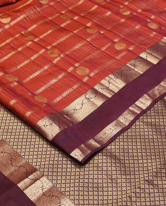 Orange zari checks and buttas Vasundhara silk mix saree, contrast rettai pettu border of rudraksham, kodi visiry and mayil designs, and scallop pallu