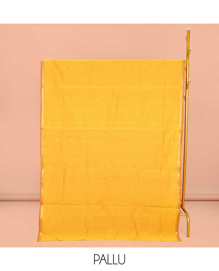 Yellow Maheshwari Cotton Saree, Sparsely Woven with Buttas All Over Its Body, Subtle Zari Piping Border, Complemented by a Contrast Pallu Steeped with Buttas, and Paired with a Contrast Blouse