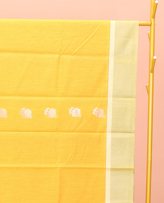 Yellow Semi-Silk Cotton Saree, Subtly Decked up with Floral Zari Buttas All Over Its Body, Complemented by Contrast Border, Pallu of Floral Designs, and Paired with a Matching Blouse