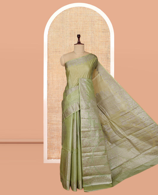 Green Tusser Silk Saree, Bedecked with Floral Design, a Zari Border, Floral Pallu, and a Matching Blouse