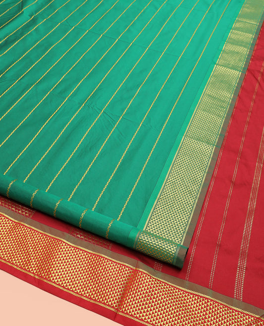 Green Ten-Yard Art Silk Saree Elevated with Neli Stripes on Its Body, Complemented by a Zari  Traditional Ara Maadam Border, and Pallu Featuring Traditional Ara Maadam Designs