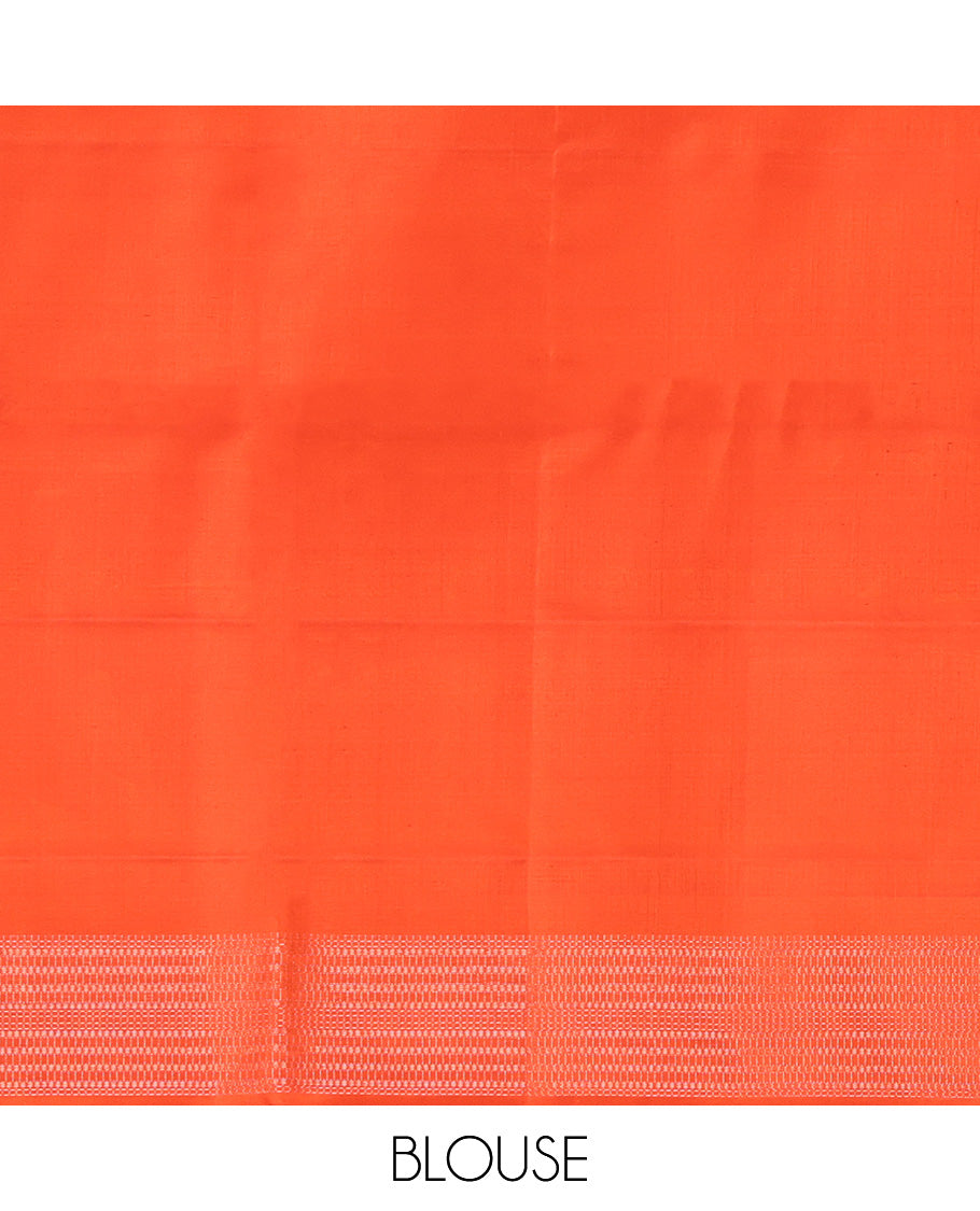 Orange Mayuri Soft Silk Saree, Subtly Sparkled with Buttas All Over Its Body, a Self-Border of Thazampoo Rekku Designs, Sparsely Woven Pallu, and Paired with a Matching Blouse