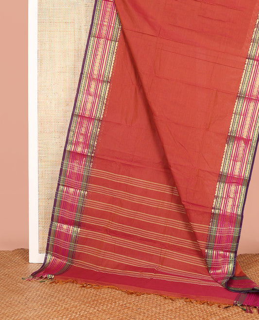Rust Orange Plain Chettinad Cotton Saree, Highlighted  by a Contrast Traditional Zari Border, and a Pallu Steeped with Stripes