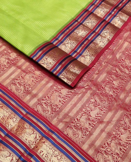 Green zari striped silk saree, contrast border & pallu of muthu,kathir,bentex & kodi mayil,yaali & yaanai designs