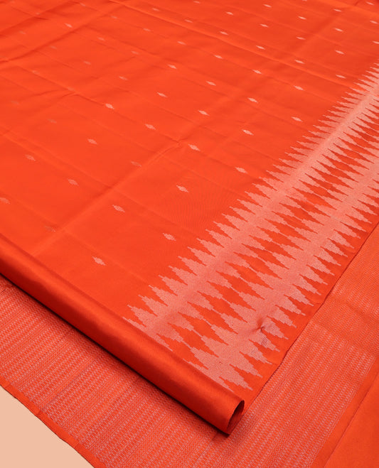 Orange Mayuri Soft Silk Saree, Subtly Sparkled with Buttas All Over Its Body, a Self-Border of Thazampoo Rekku Designs, Sparsely Woven Pallu, and Paired with a Matching Blouse