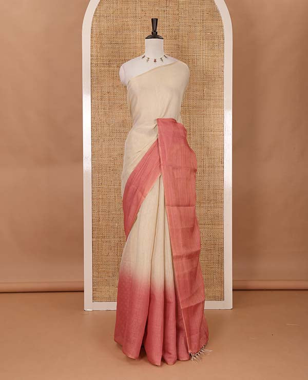 Borderless sandal-pink plain ombre-colored tissue saree, plain pallu & circle motifs printed blouse