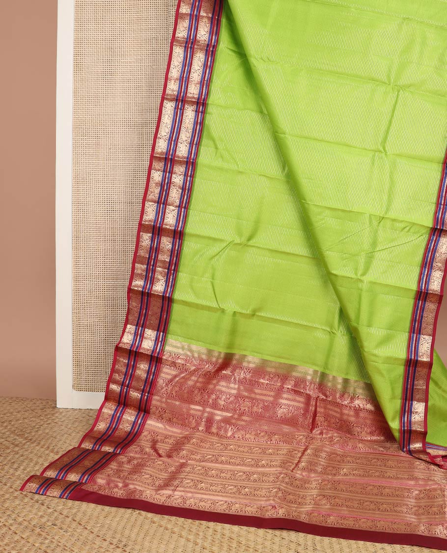 Green zari striped silk saree, contrast border & pallu of muthu,kathir,bentex & kodi mayil,yaali & yaanai designs