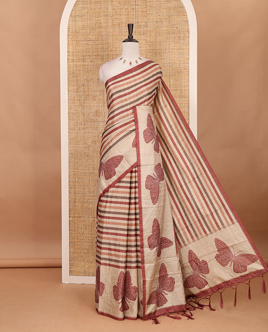 Magenta horizontal stripes printed soft tussar saree adorned with big butterfly motifs printed border and pallu, contrast blouse