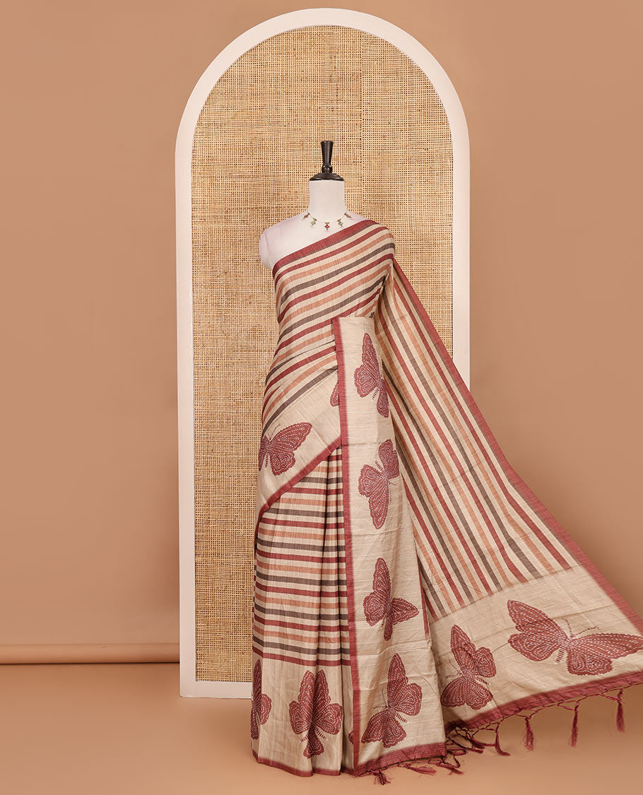 Magenta horizontal stripes printed soft tussar saree adorned with big butterfly motifs printed border and pallu, contrast blouse