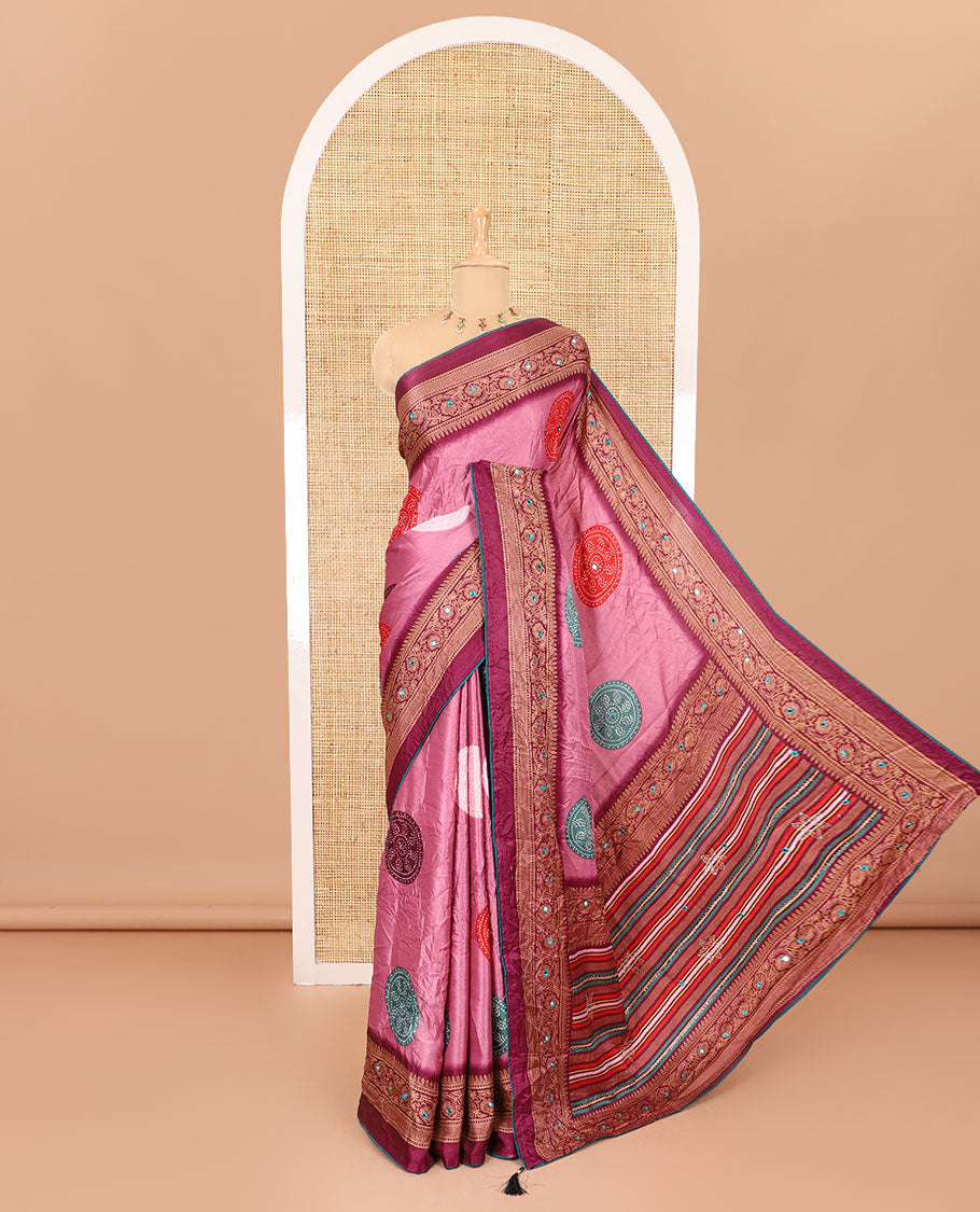 Pink bandhani printed with mirror work moss crepe saree, contrast traditional design mirror work border, printed pallu of Swarovski stone work, and a contrast plain blouse
