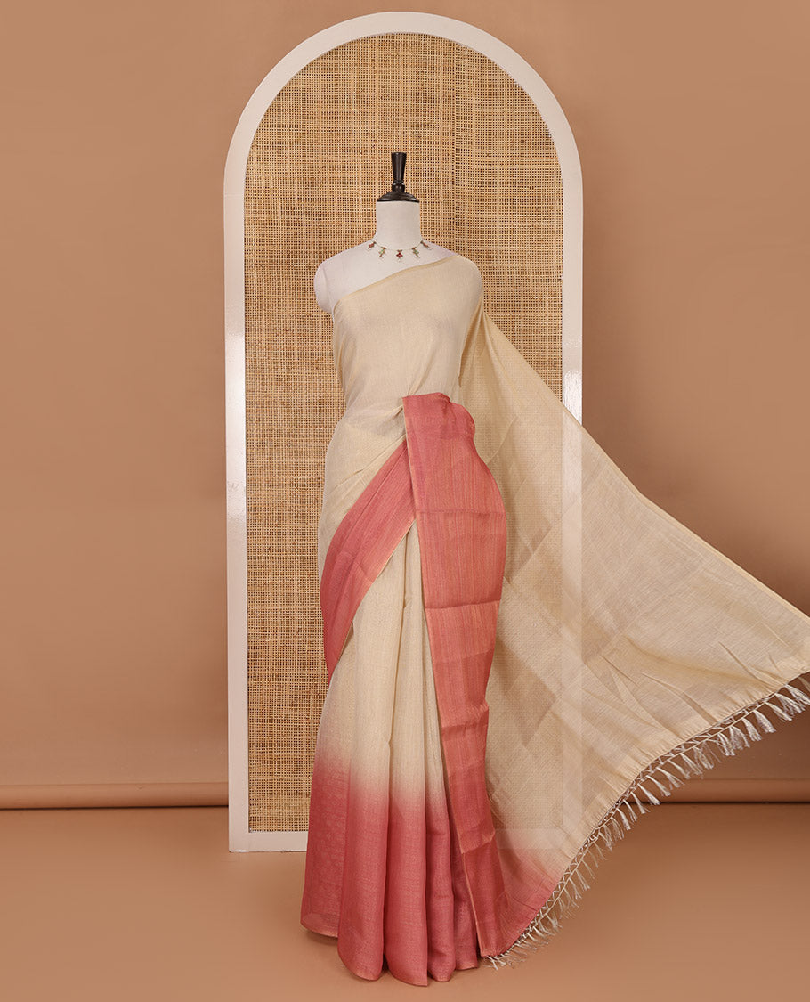 Borderless sandal-pink plain ombre-colored tissue saree, plain pallu & circle motifs printed blouse
