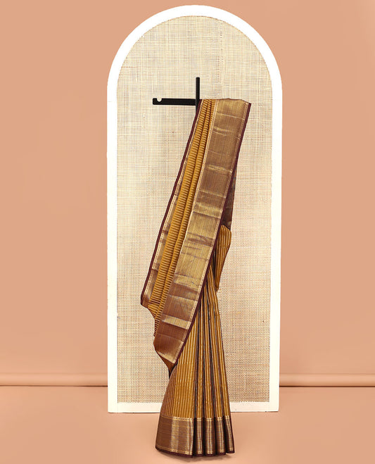 Mustard Vasundhara Lite Silk Mix Saree, Prettified with Neli, Muthu, and Banaras Buttas, Complemented by a Contrast Border of Muthu Designs, Grandly Woven Jaal Design Pallu, and Paired with a Contrast Blouse