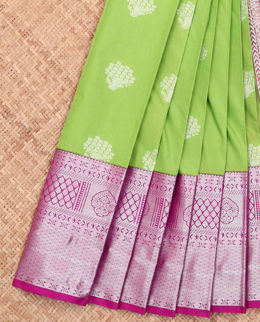 Green Budget Silk Saree, Accentuated with Floral Buttas All Over Its Body, Complemented by a Contrast Traditional Zari Design Border, Pallu Steeped with Floral Buttas, and Paired with a Contrast Blouse