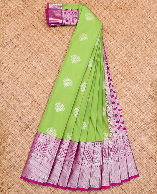Green Budget Silk Saree, Accentuated with Floral Buttas All Over Its Body, Complemented by a Contrast Traditional Zari Design Border, Pallu Steeped with Floral Buttas, and Paired with a Contrast Blouse