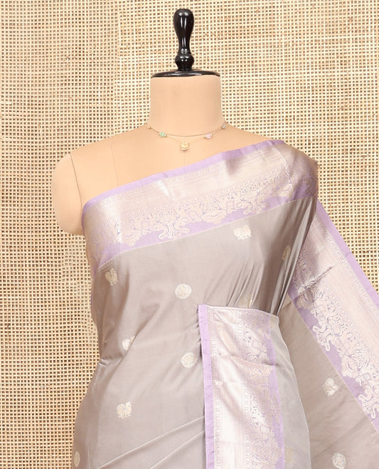 Grey Budget Silk Saree, Sparsely Threaded with Peacock-Chakram Buttas, Complemented by Contrast Traditional Zari Border, Pallu of Jaal and Paisleys, and Contrast Blouse