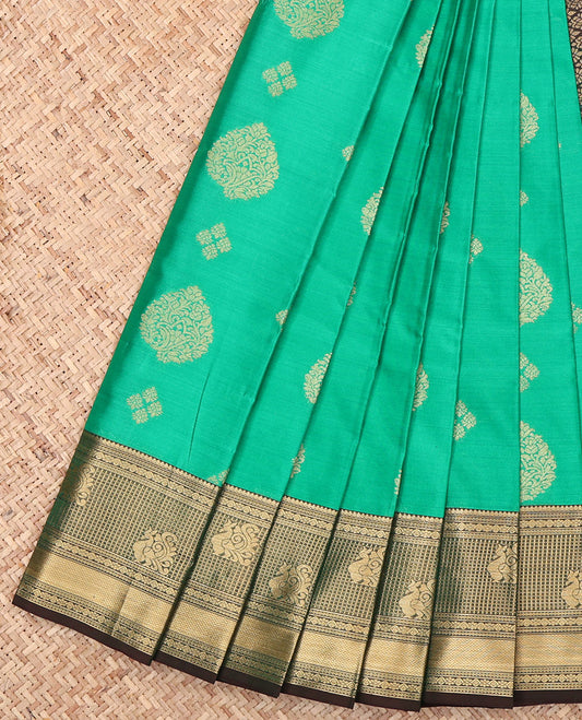 Green Budget Silk Saree, Graced with Zari Buttas, Complemented by a Contrast Traditional Zari Border, Jaal Pallu, and a Contrast Blouse