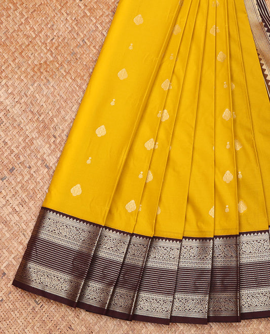 Yellow Budget Silk Saree, Sparsely Woven with Zari Buttas on Its Body, Complemented by a Contrast Traditional Zari Design Border, Geometric Patterned Pallu, and Paired with a Contrast Blouse