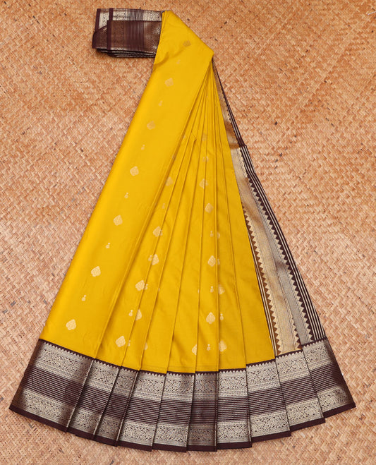 Yellow Budget Silk Saree, Sparsely Woven with Zari Buttas on Its Body, Complemented by a Contrast Traditional Zari Design Border, Geometric Patterned Pallu, and Paired with a Contrast Blouse