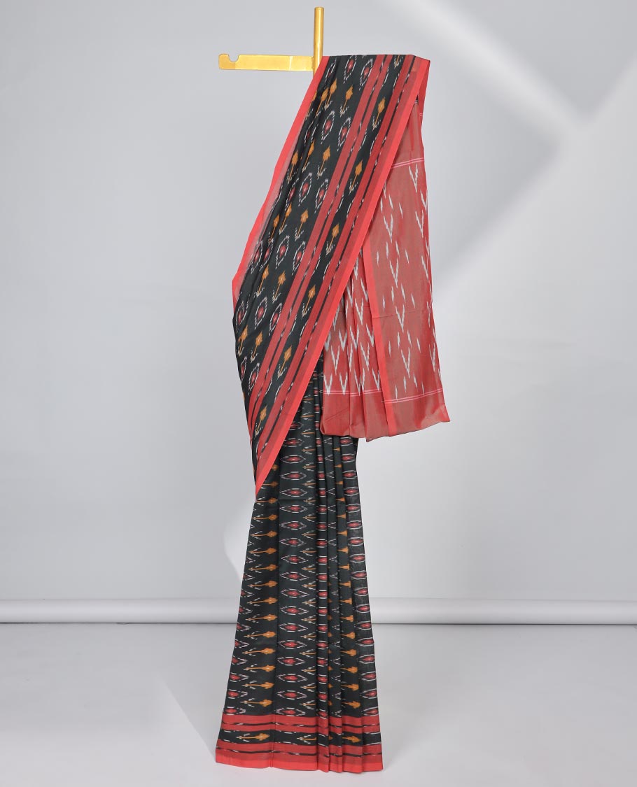 Black floral design ikkat cotton saree with contrast floral border & geometric design pallu