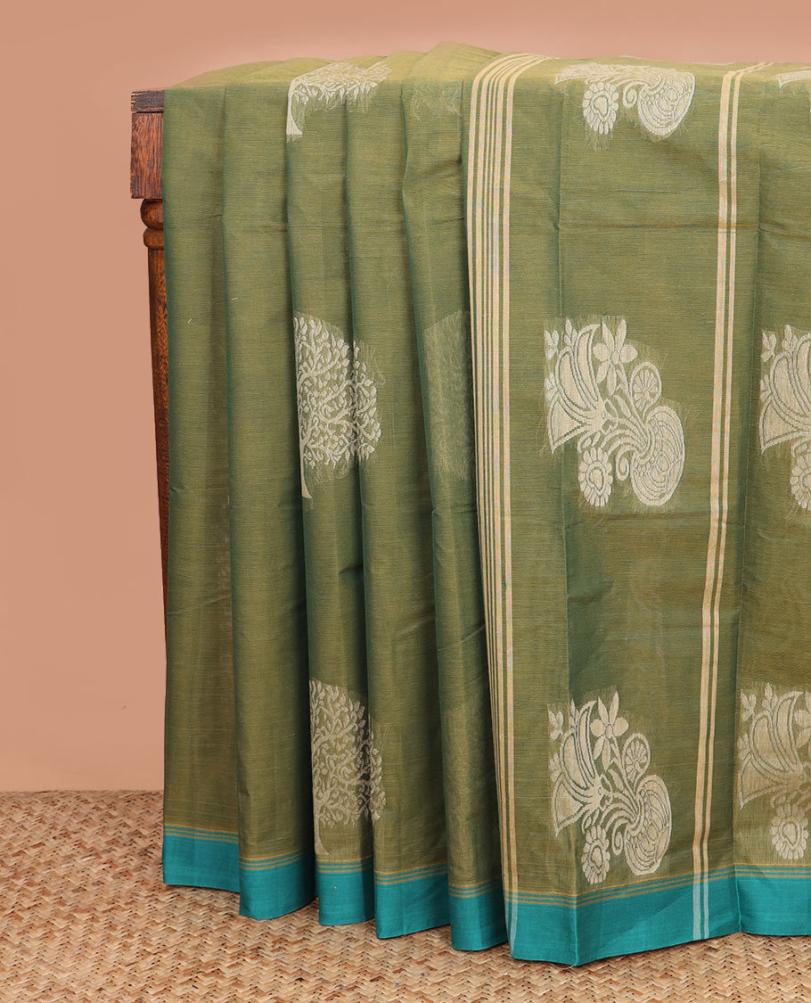 Green tree buttas kanchi cotton saree, contrast plain border, and floral potted pallu