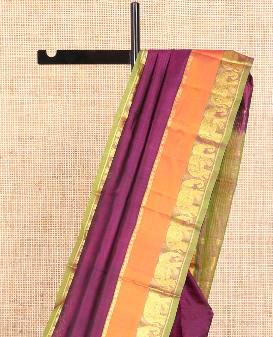 Purple striped kancheepuram silk saree with contrast border of thilakam mokku, yanaai design & zari design pallu