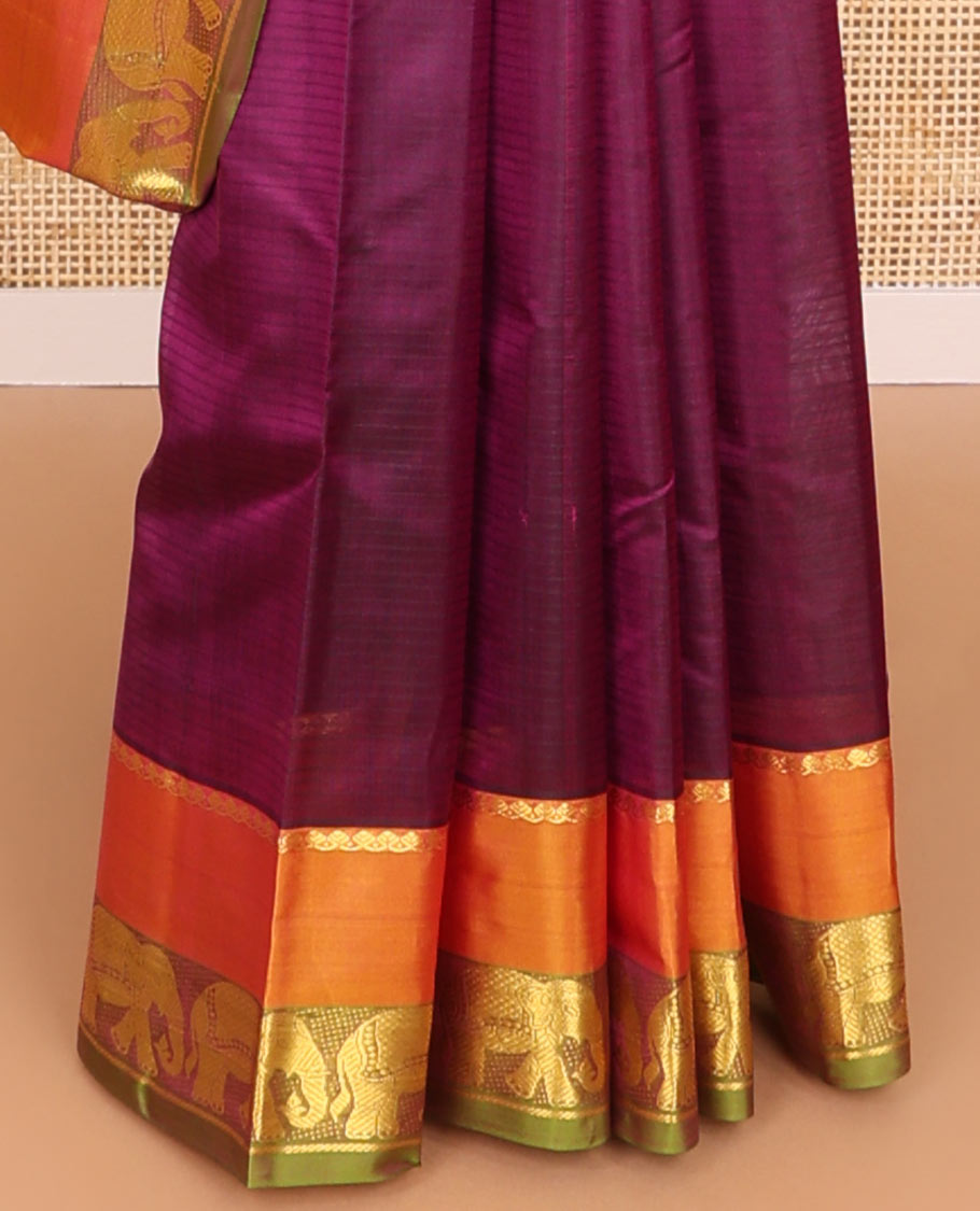 Purple striped kancheepuram silk saree with contrast border of thilakam mokku, yanaai design & zari design pallu