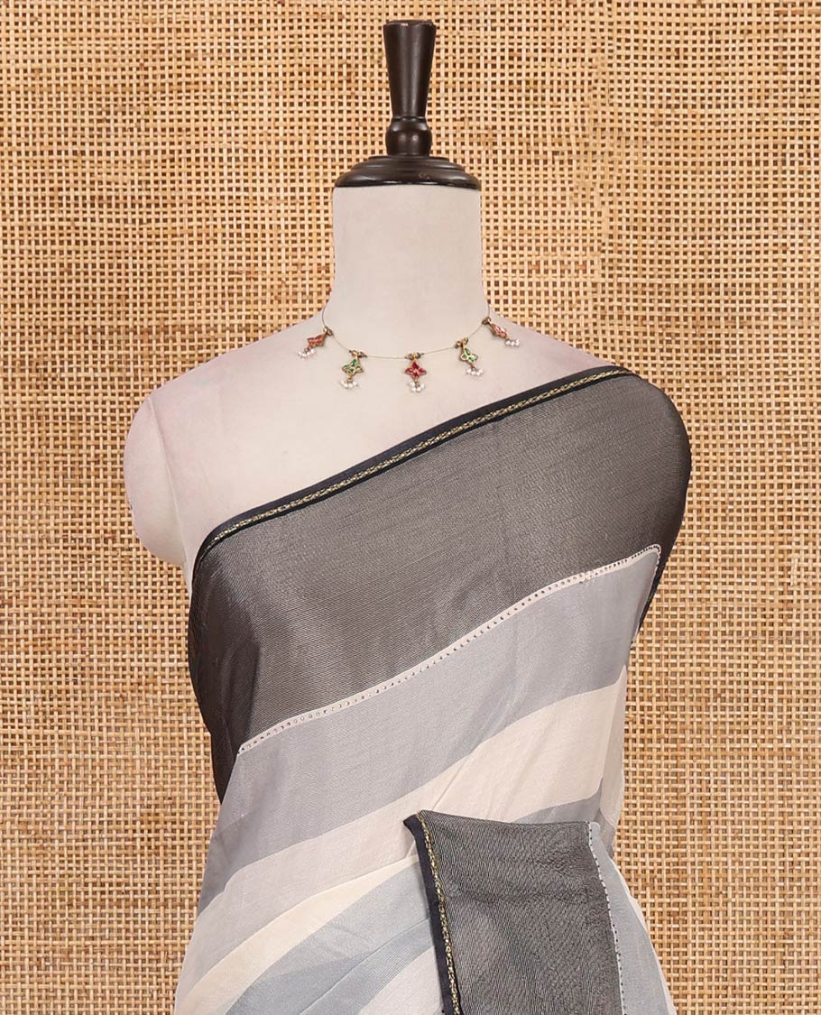 Grey horizontal stripes printed lassi cotton saree, lace border & contrast buttas woven blouse