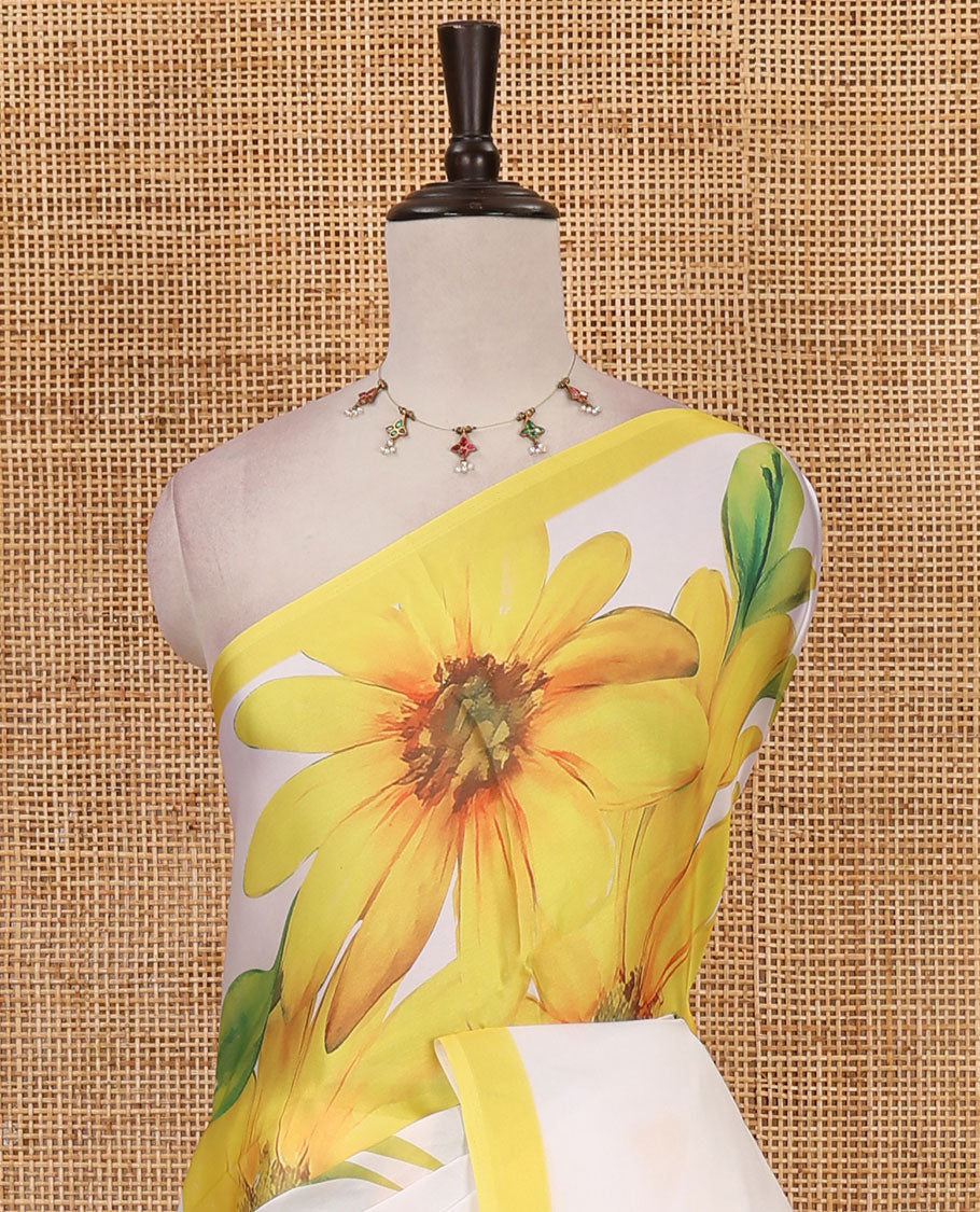Cream base digital printed satin crepe saree with big yellow floral motifs all over the saree, plain yellow border & blouse