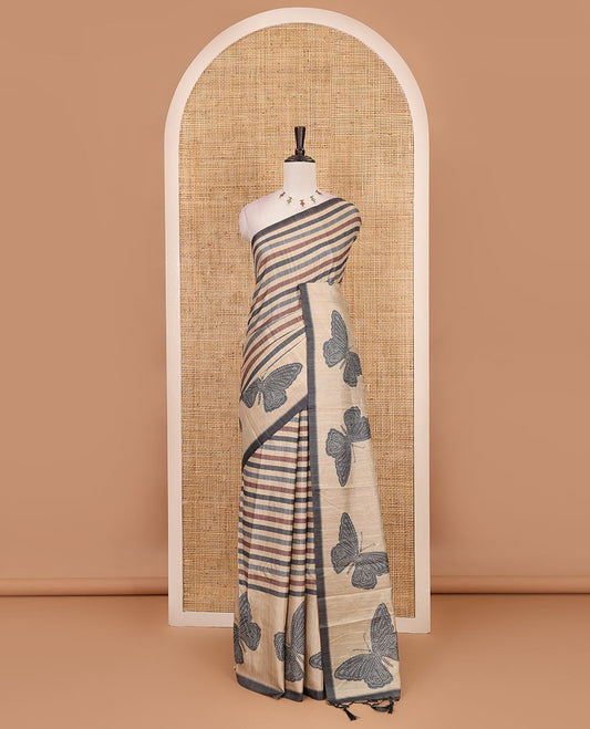 Green horizontal stripes printed soft tussar saree adorned with big butterfly motifs printed border and pallu, contrast blouse