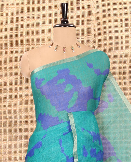 Bue shibori printed linen cotton saree, piping border, contrast floral printed pallu, and a contrast floral printed blouse