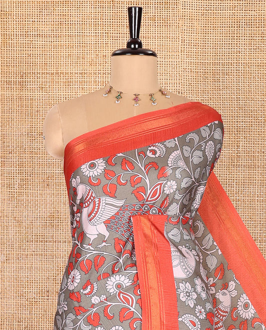 Sage Green Manipuri Silk Saree, Accentuated with Kalamkari-Style Floral Vine and Peacock Motifs Printed All Over Its Body, Complemented by a Contrast Zari Border, Pallu of Chevron Stripes, and Paired with a Contrast Blouse