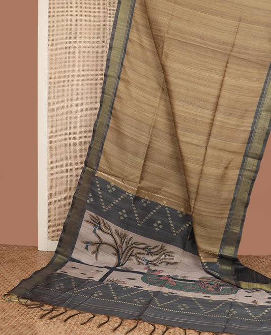 Brown plain tussar silk saree, contrast zari border, and pallu printed with ancient purana-inspired motifs