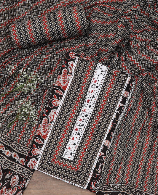Black material chudidar set, floral vine print with neck embroidery top, chevron printed bottom, and chevron printed dupatta