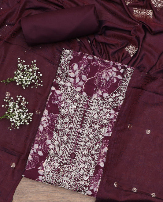 Maroon material chudidar set, floral print with neck embroidered top, plain bottom and printed duppata of flower buttas