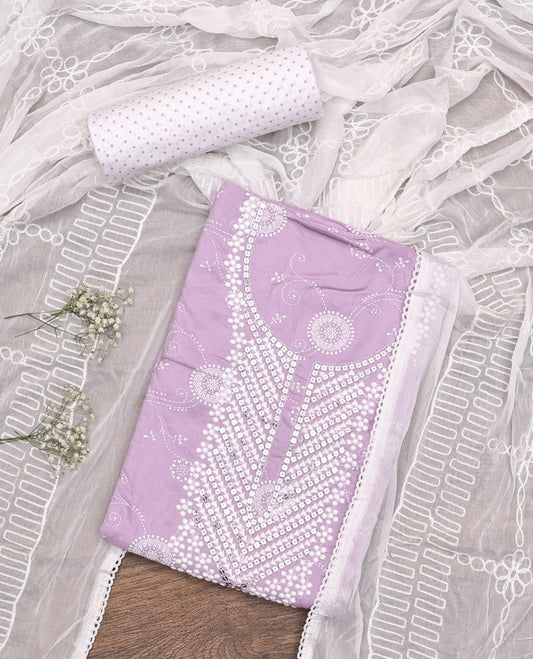Light Lavender Material Chudidar Set, Adorned with Subtle Print and Neck Embroidery on Rayon Top, a Contrast Polka Dot Printed Bottom, and Paired with Embroidered Chiffon Dupatta